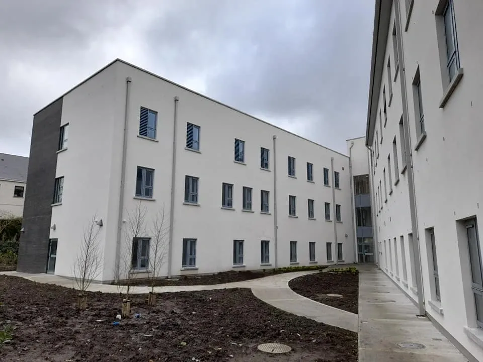 Rendered apartment building with clean white walls